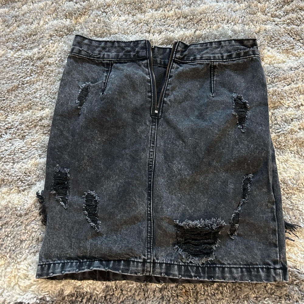 Distressed black denim